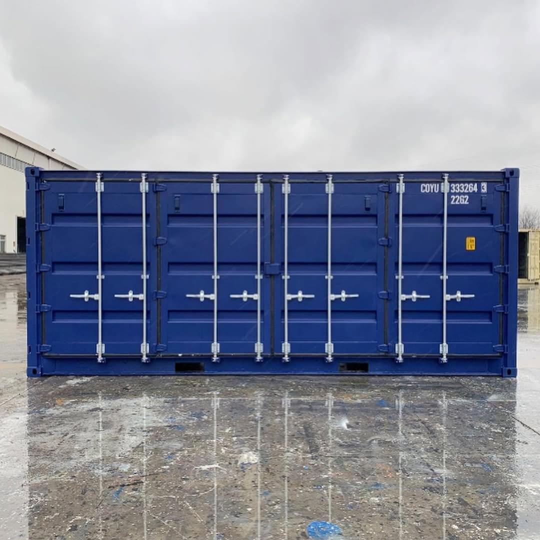A new 20ft open side full access shipping container with its side doors open, showing the spacious interior.