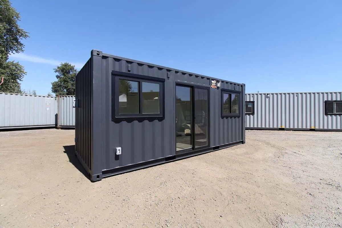 A modern 20ft sales office container with glass French doors and large windows, ready for business.