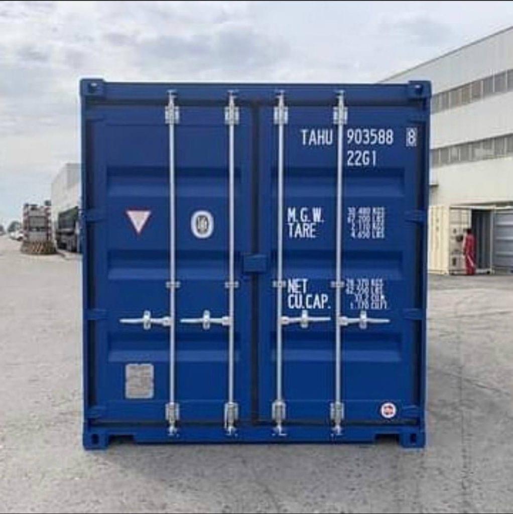 A clean, blue 20ft high cube container with its doors closed, ready for delivery.