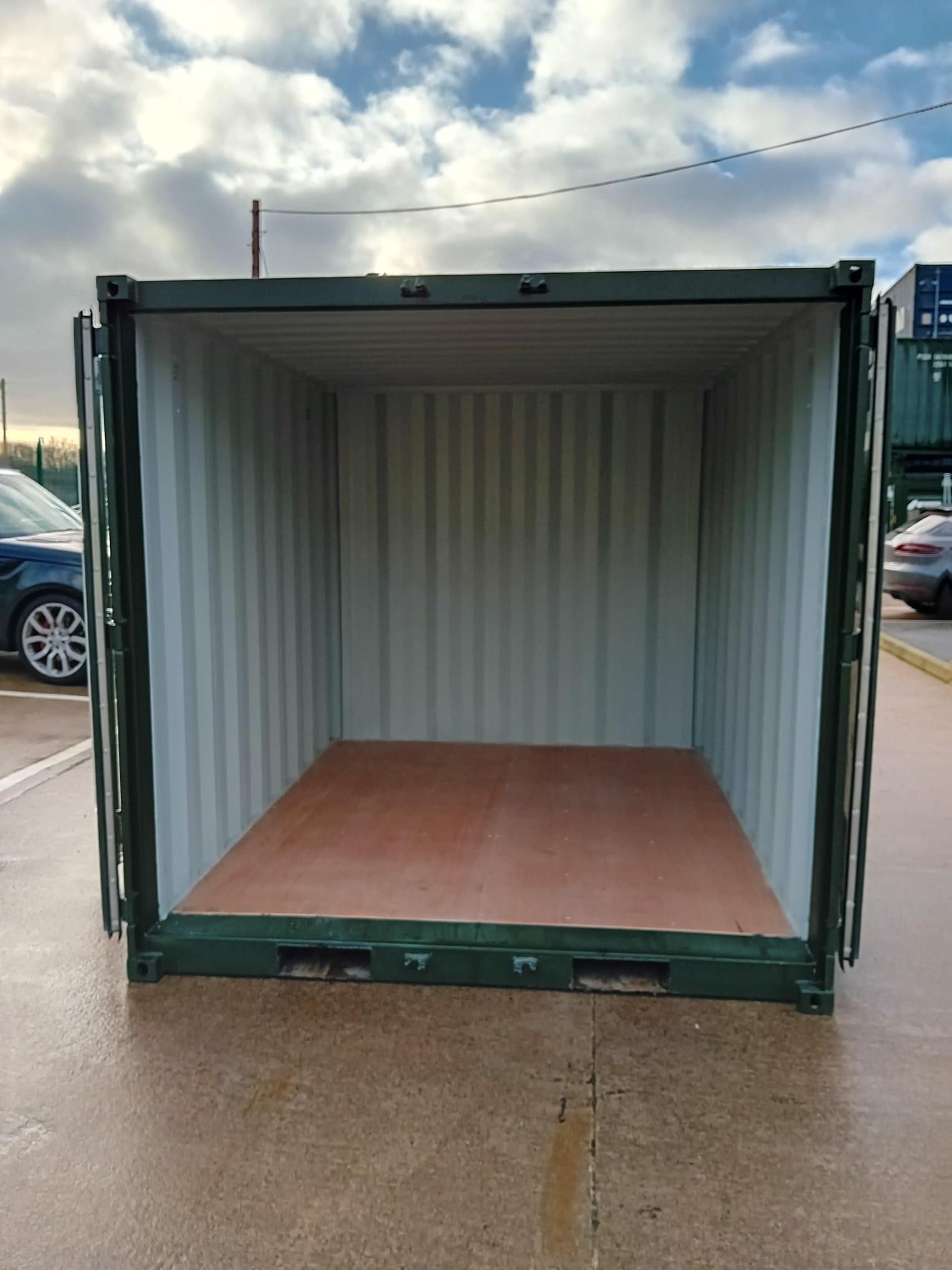 A brand new 9ft shipping container in a clean, open space, ready for secure storage.